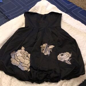 Cute black dress with tan flower detail